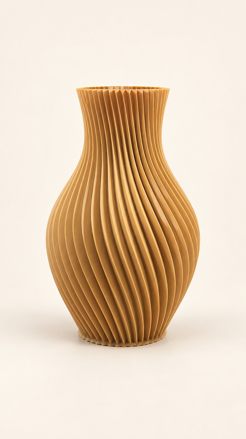 Golden tan vase with spiraling vertical ribs.